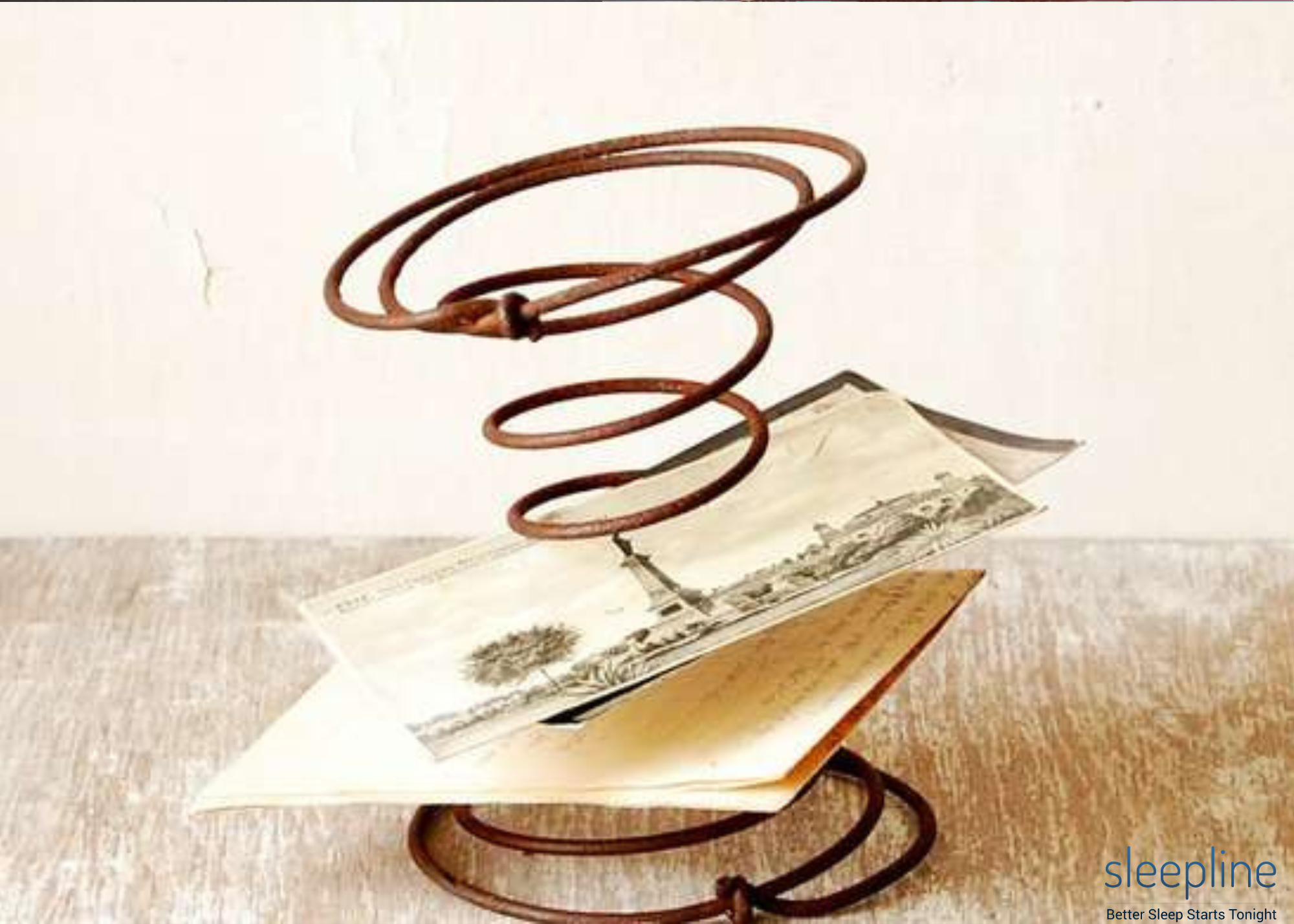 Old bed springs turned into a letter holder