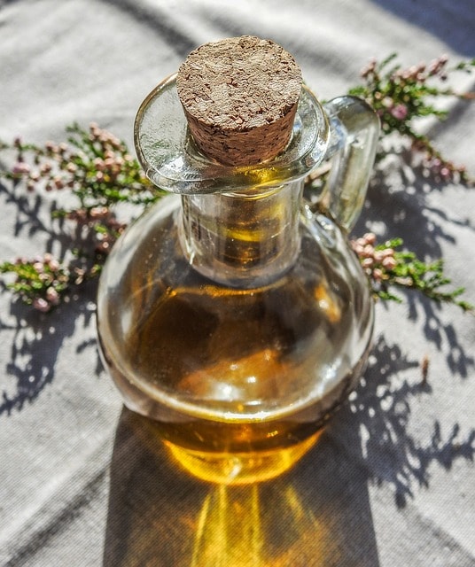 essential oils, oil, bottle, glass, sunlight, nature, medicine, healthy, natural, kitchen, alternative, herb, plant