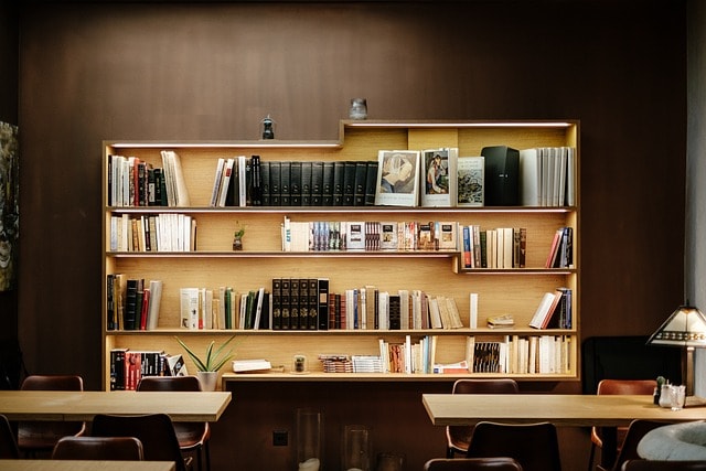 books, bookshelves, chairs