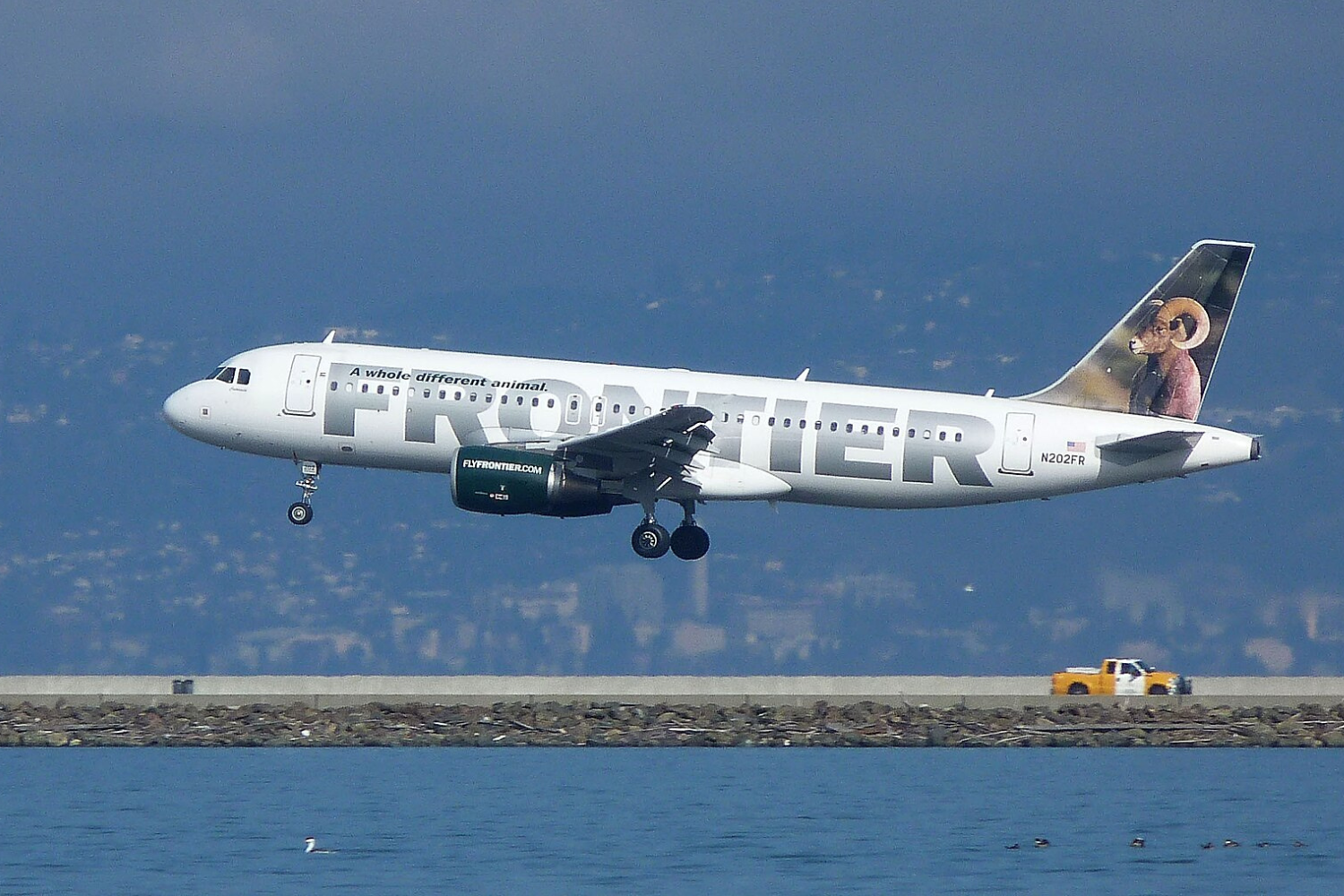 frontier airlines flight over the sea