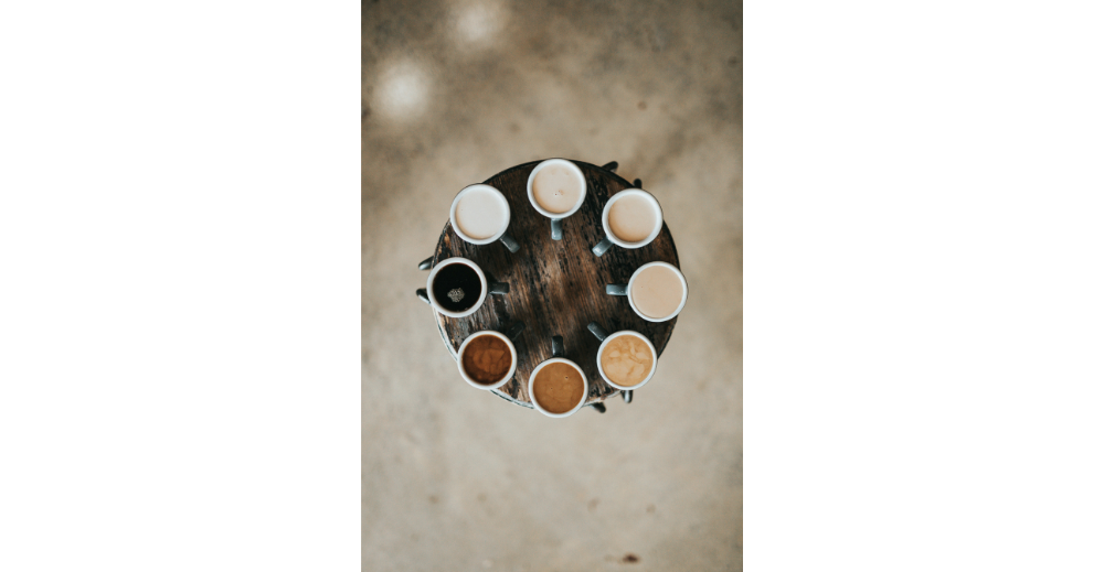 different coffee flavors in a wooden table
