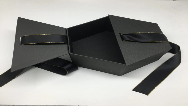 black packaging box with ribbon