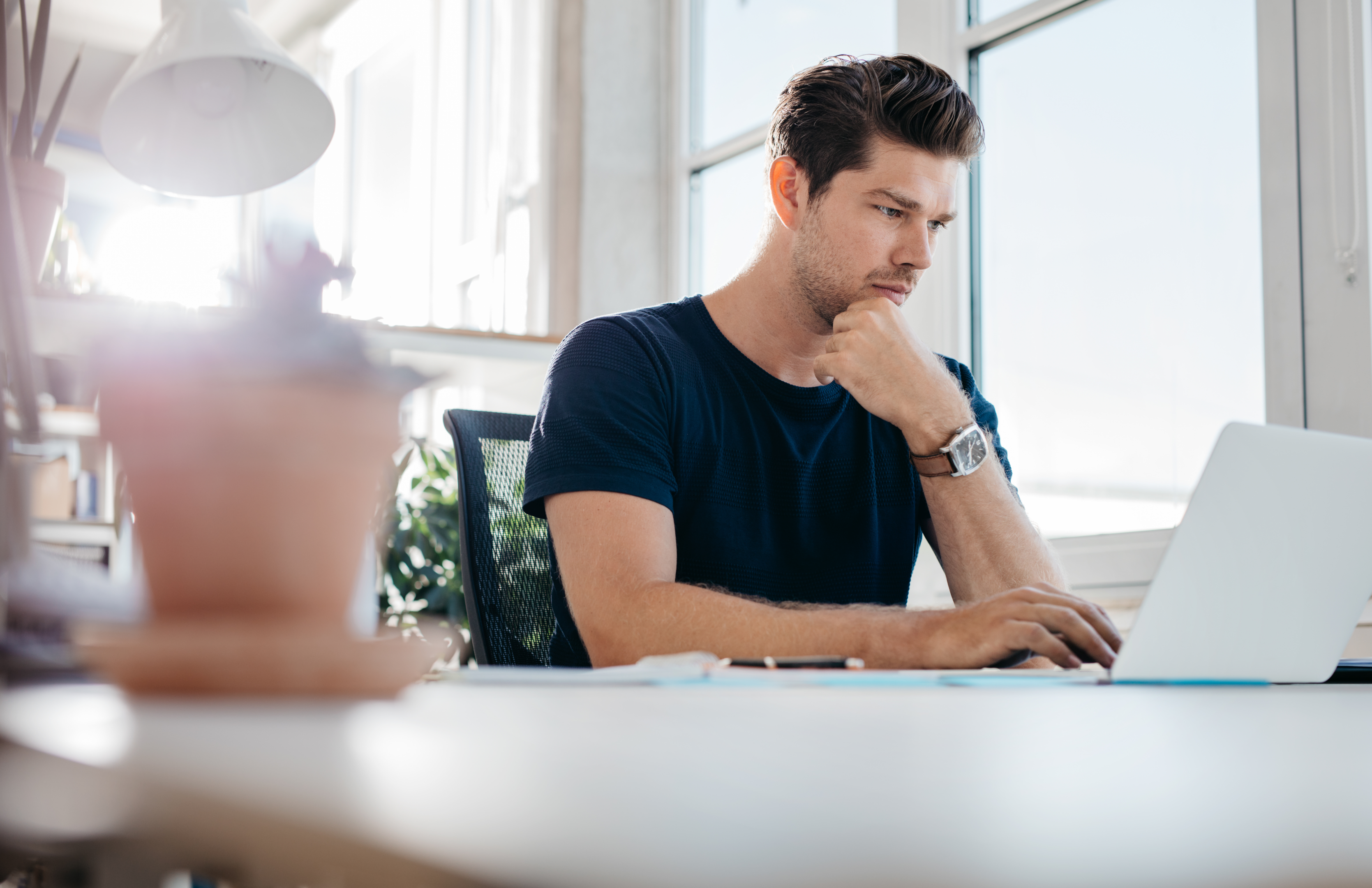 Man looking at laptop