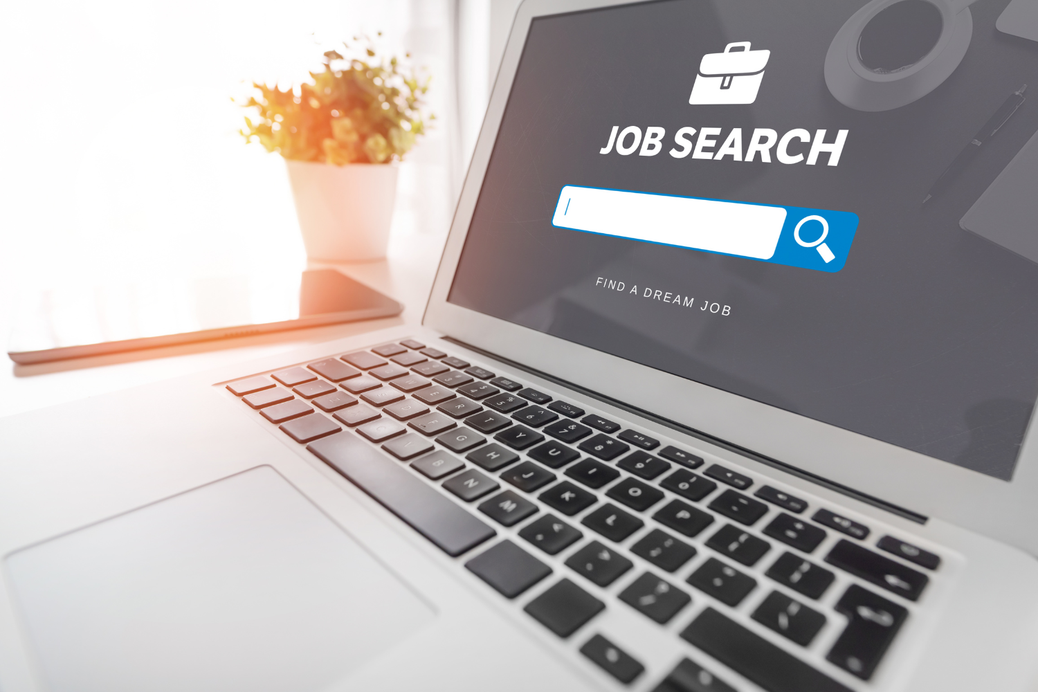 Laptop showing job search.