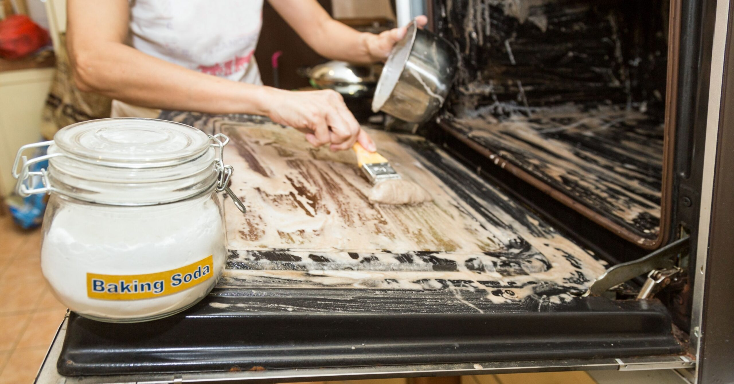 Coat your oven with baking soda paste