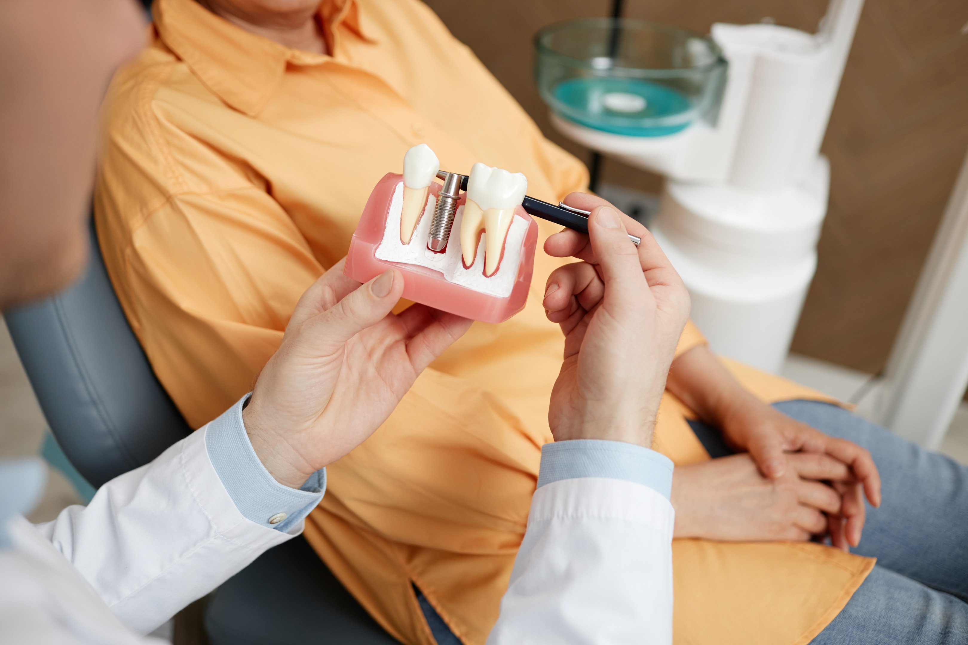 dental model showing dental implant as an option for tooth replacement