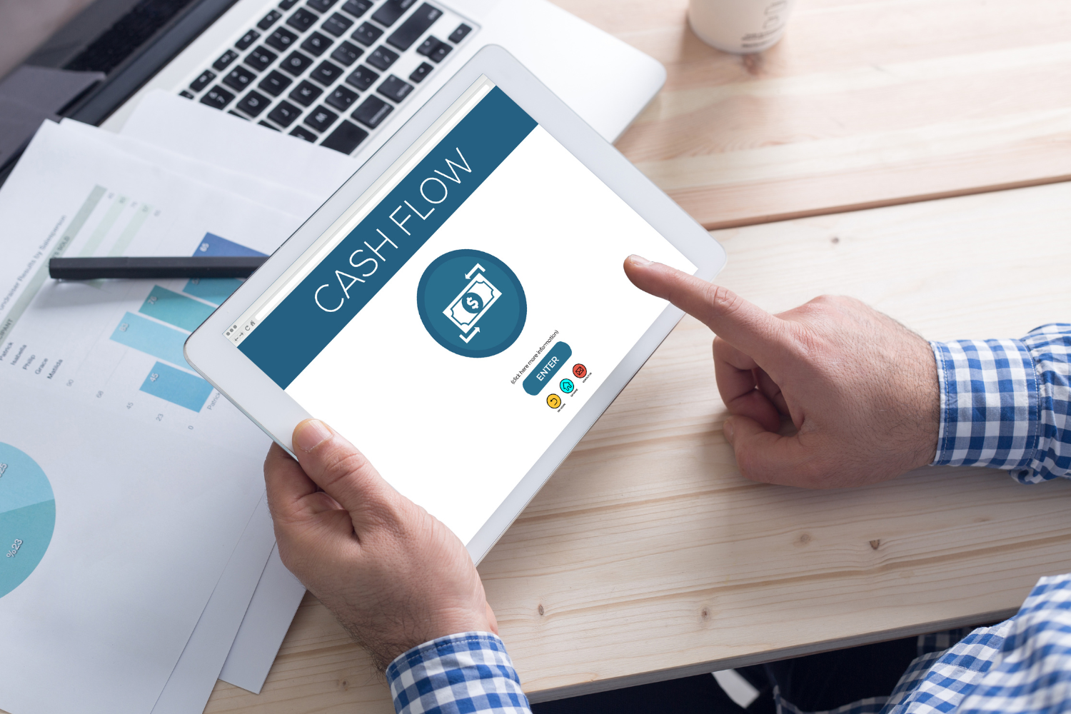 Business owner reviewing cash flow metrics during the valuation of a business.