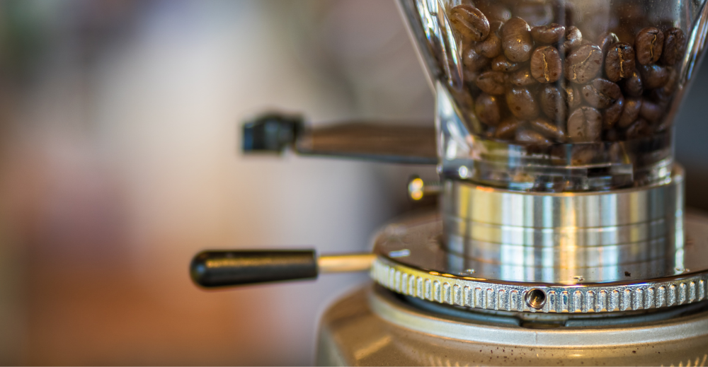 Professional grinding mechanism. Barista grind coffee beans using