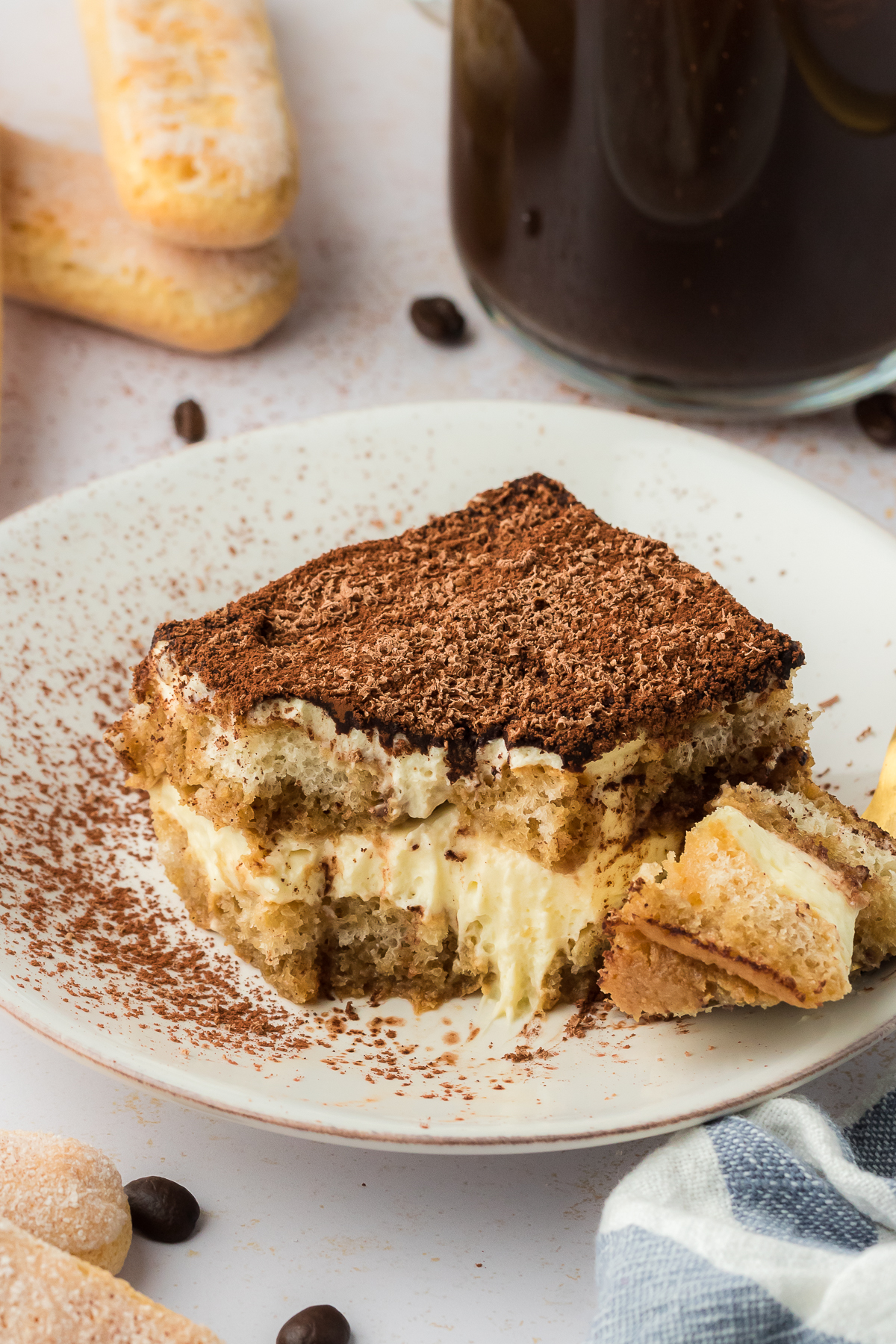 slice of Tiramisu on a plate with a fork