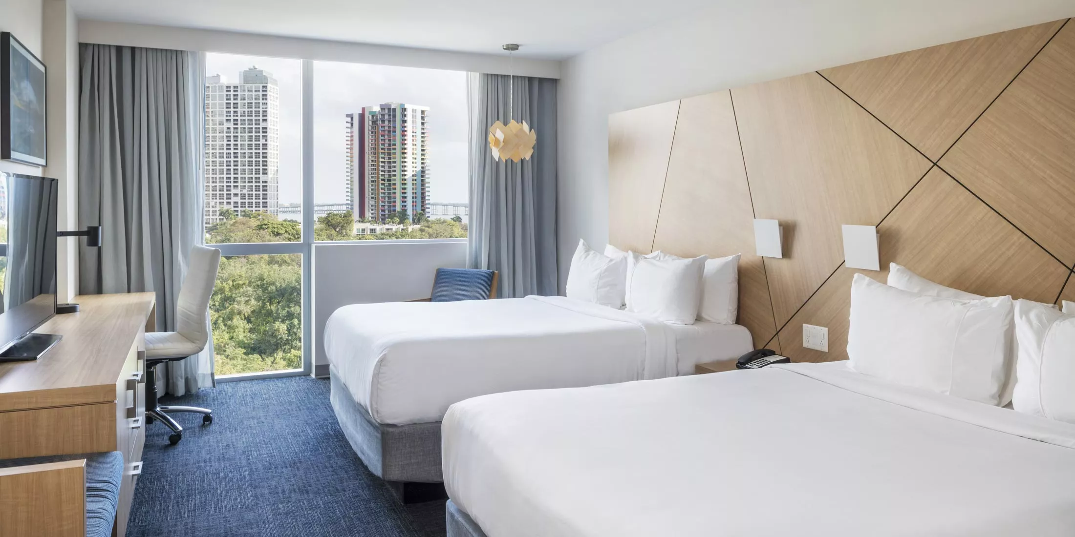 Image sourced from Novotel's website at: https://www.google.com/url?sa=i&url=https%3A%2F%2Fwww.novotelmiami.com%2Frooms%2Fsuperior-double-queen%2F&psig=AOvVaw2mD1iFqhUp95woOv8VFetW&ust=1669275824682000&source=images&cd=vfe&ved=0CBAQjRxqFwoTCLi2wpjnw_sCFQAAAAAdAAAAABAE