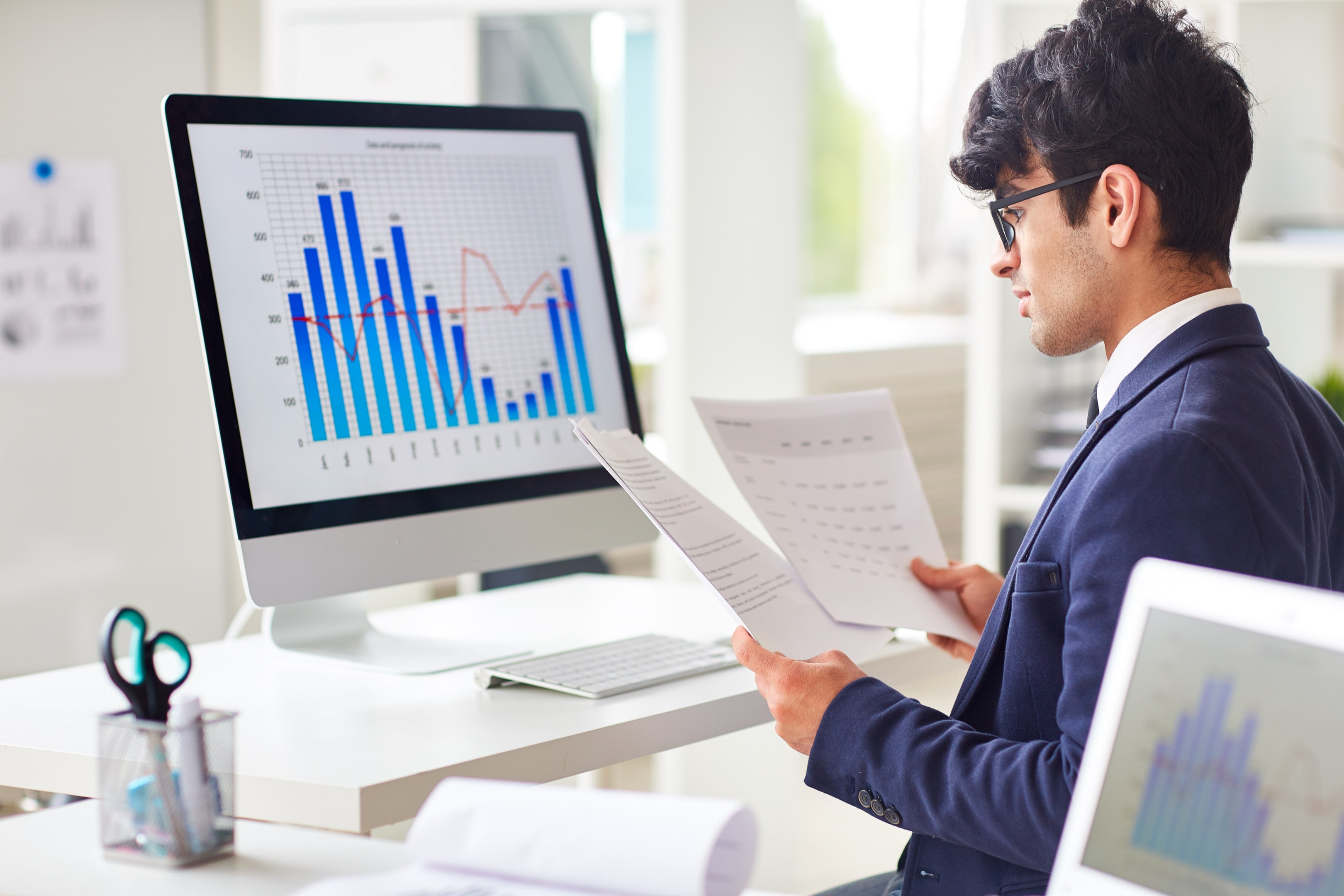 Person analyzing betting data on a computer