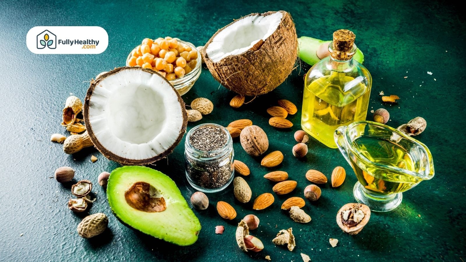 Variety of oils and nuts with avocado and coconut on table