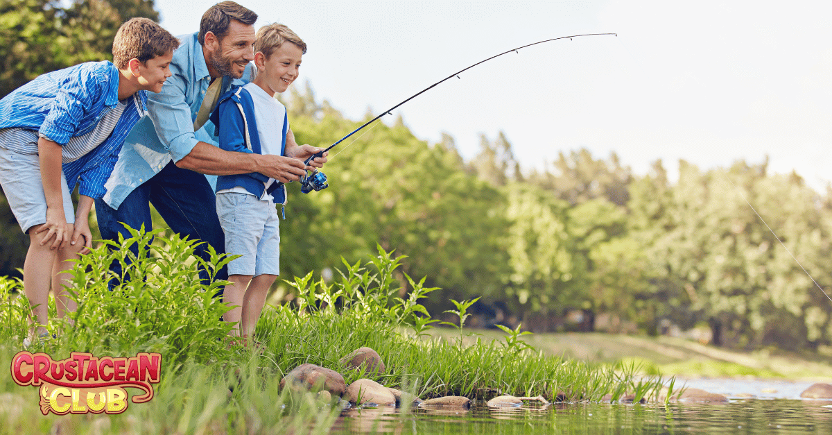 Family fishing by the pond in the park