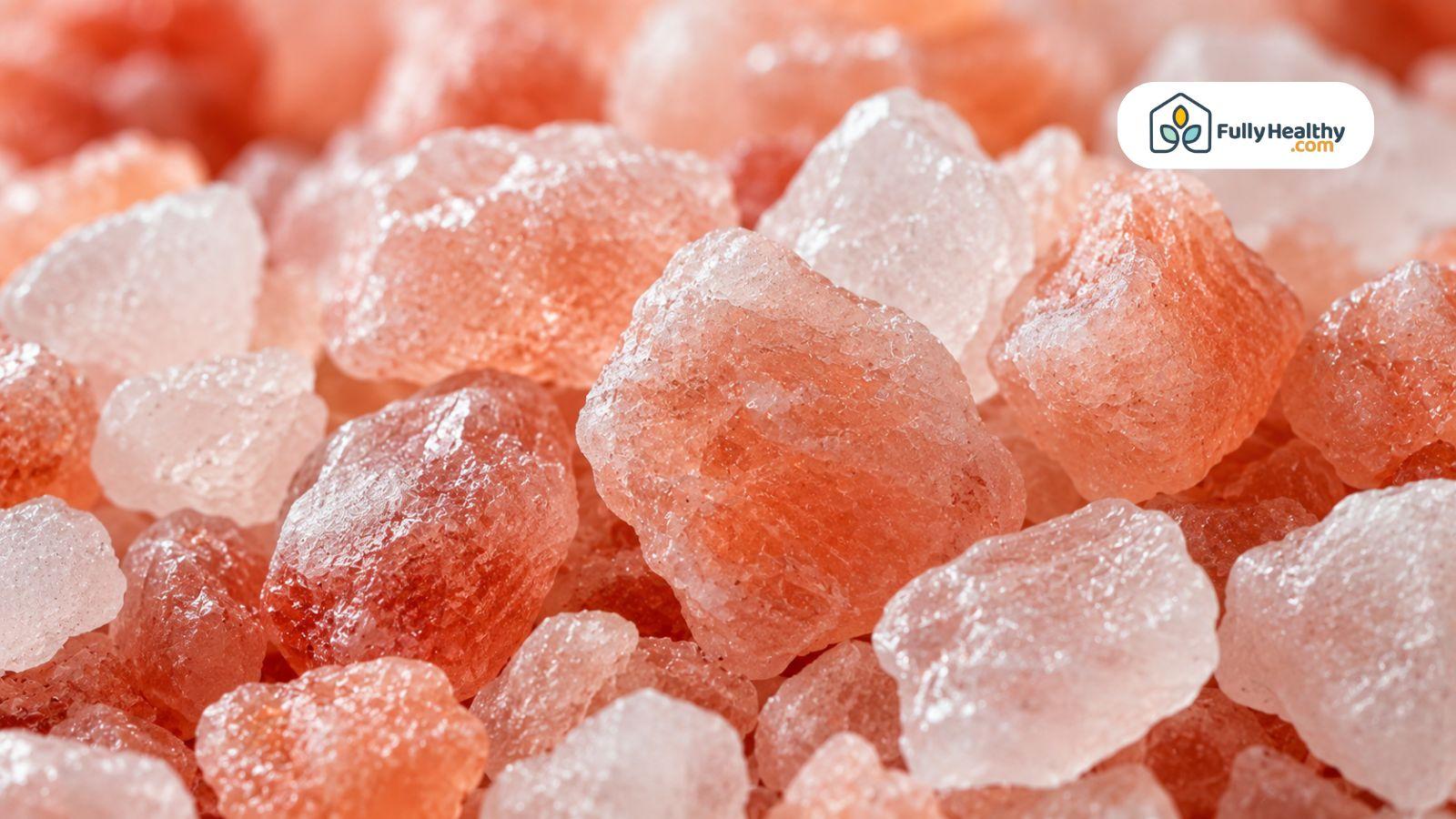 Close-up of natural Himalayan pink salt crystals showing rich texture and color