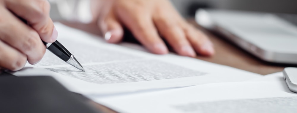 A lawyer reviewing traffic accident reports from government agencies crash reports unit for personal injury claims.