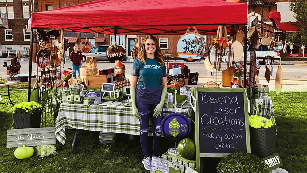 craft fair booth with Jena Streans of Beyond Laser Creations