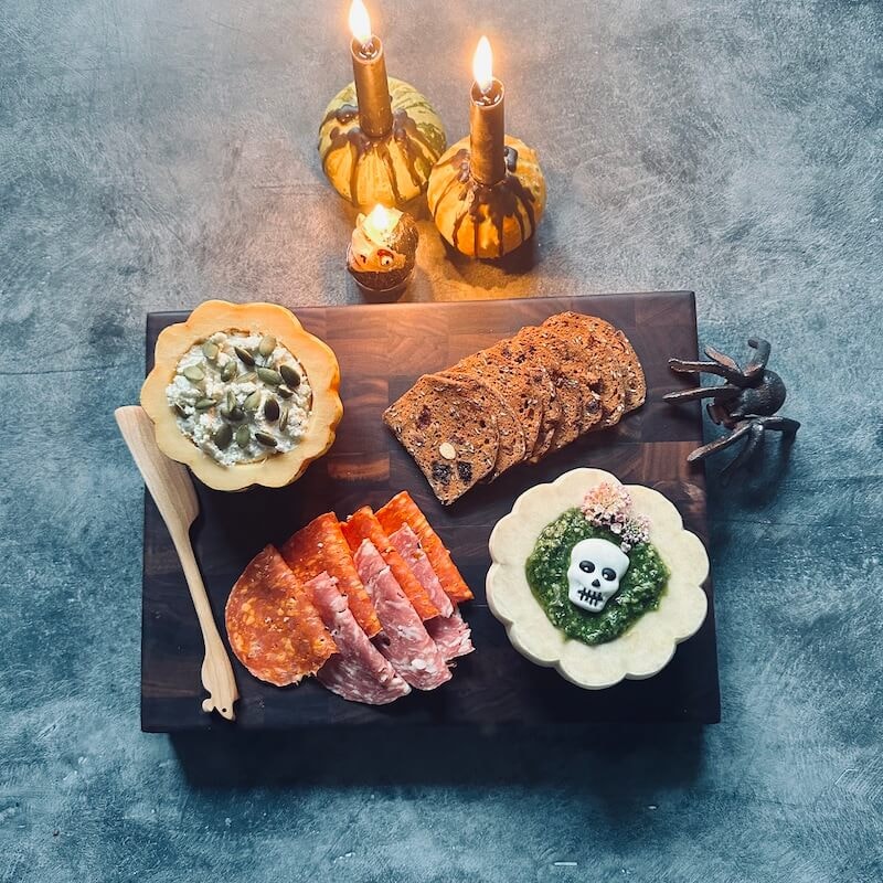 Charcuterie board with pumpkin bowls