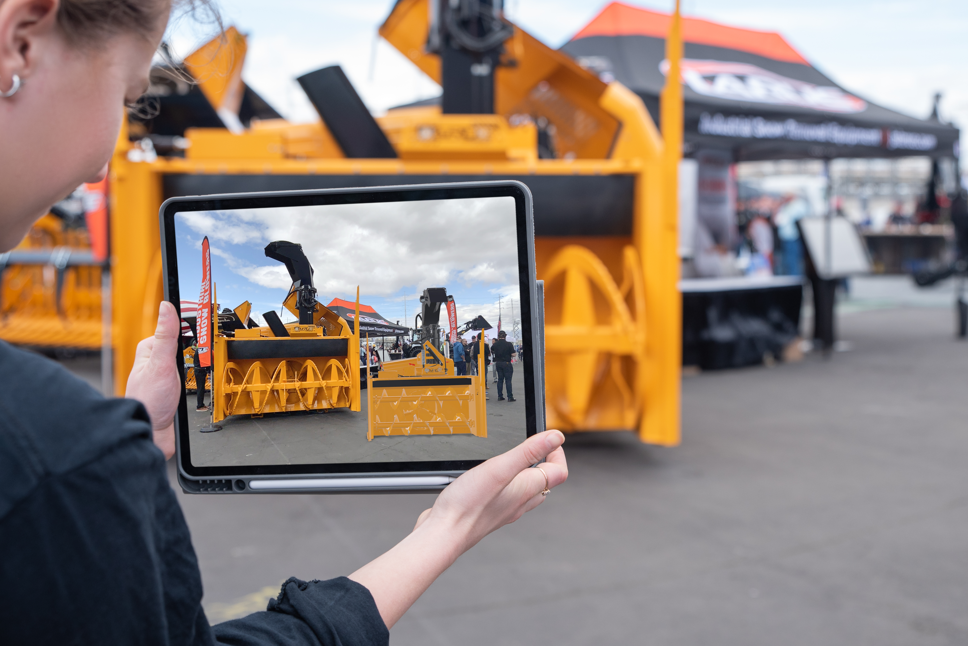 woman holding ipad with augmented reality feature