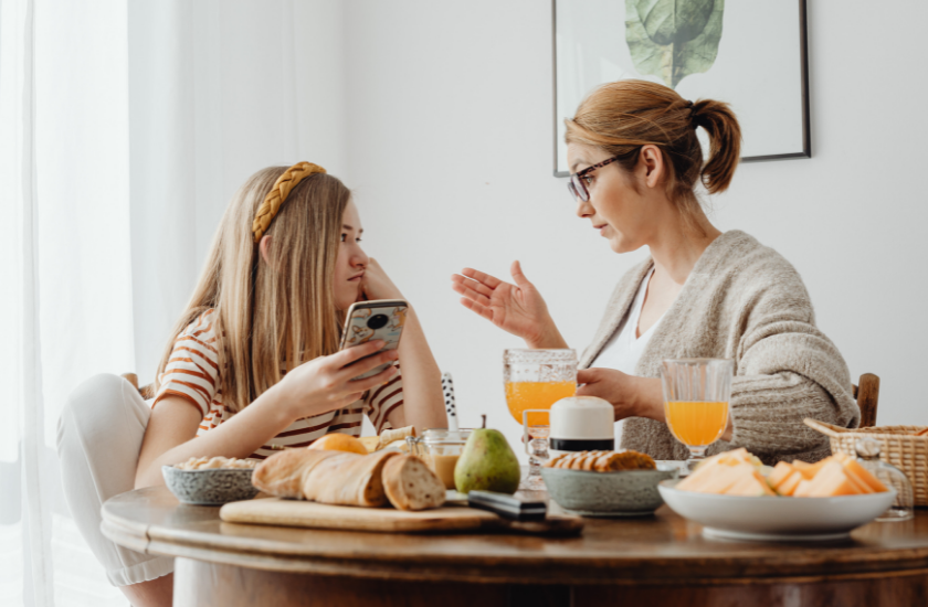 A Mother talking to a teenage daughter  