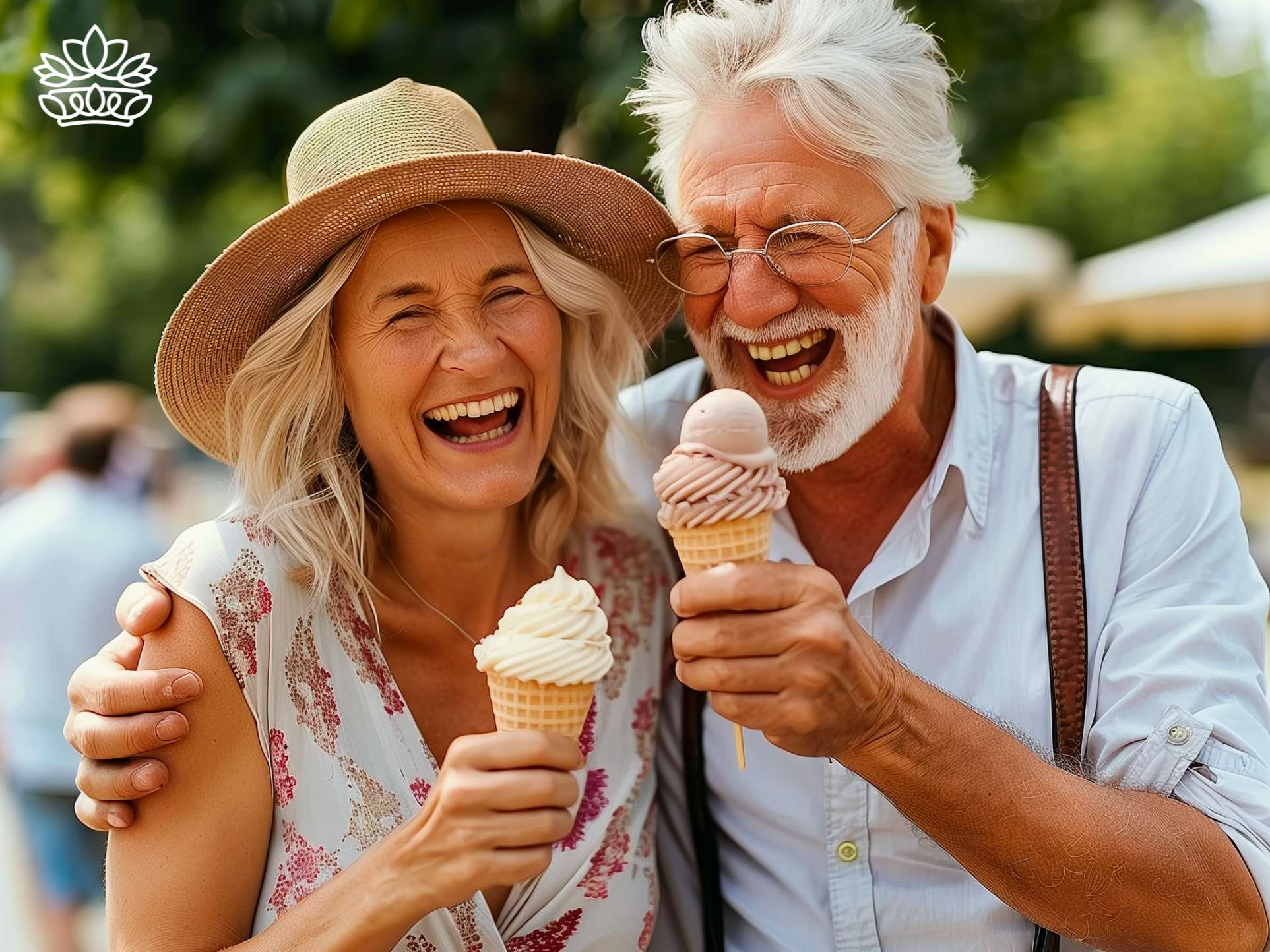 A radiant elderly couple laughing heartily, enjoying creamy ice creams on a sunny day, embodying the joy of life's simple pleasures with Fabulous Flowers and Gifts
