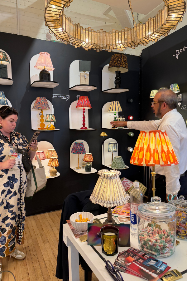 the display wall at Pooky; we prefer the glass orb bases in the center row, but nothing was missing from this bunch of lamps!