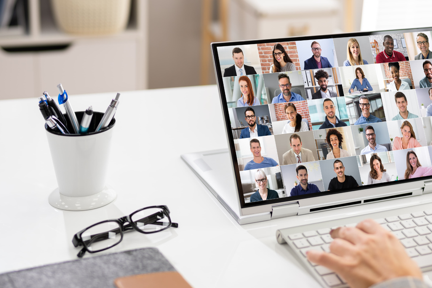 The whole team on a group meeting via video call.