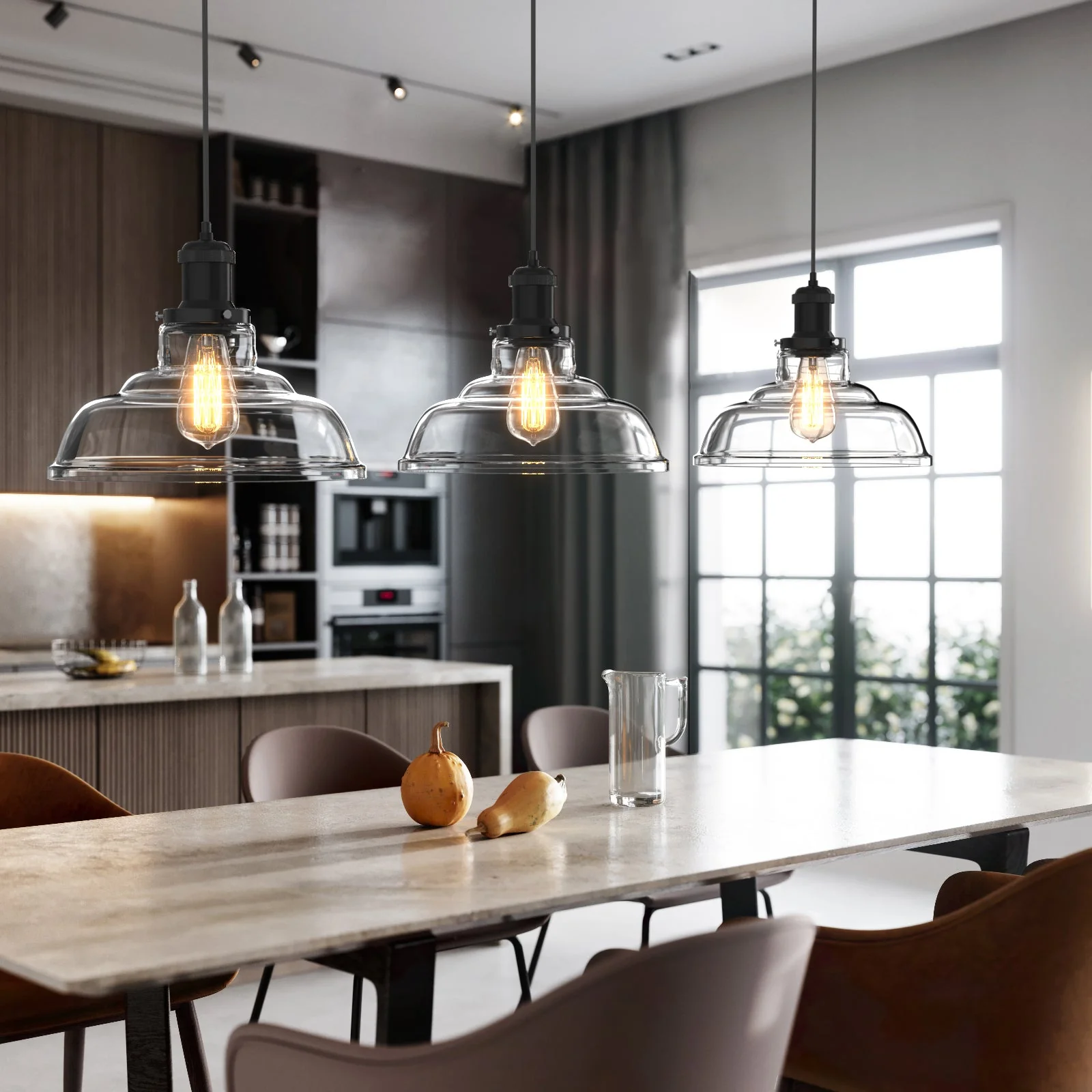 Half dome glass pendant lights hanging from the ceiling, casting a warm glow and serving as an ideal light fixture for the dining room.