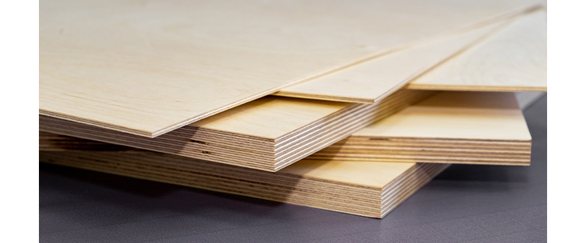 A cross section of plywood, showing the different compressed layers of wood.