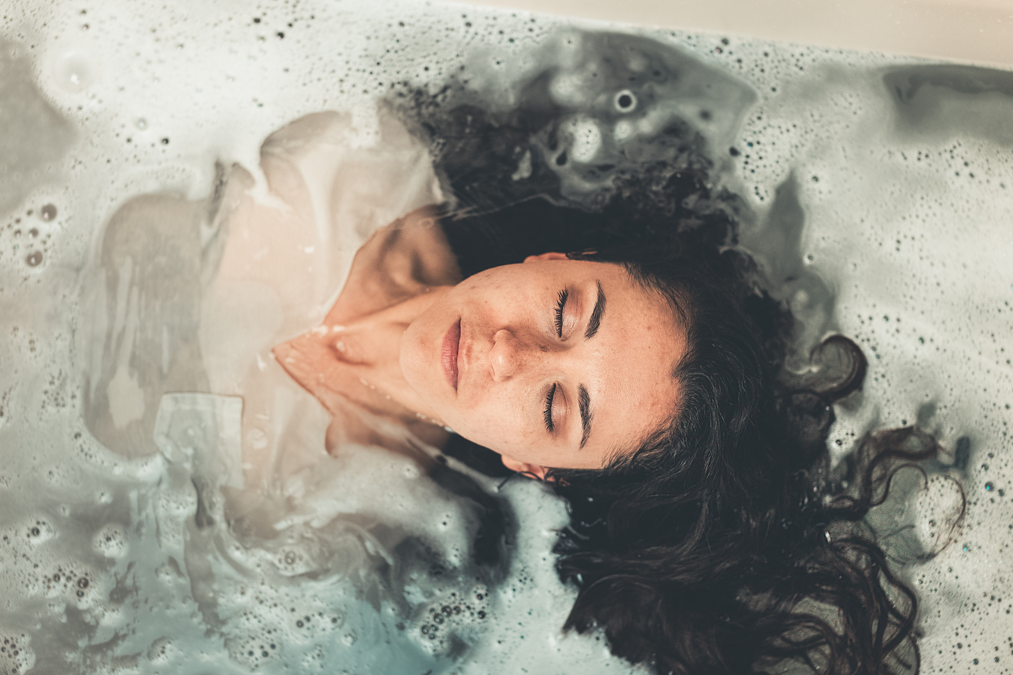 Head of woman bathing after ritual 