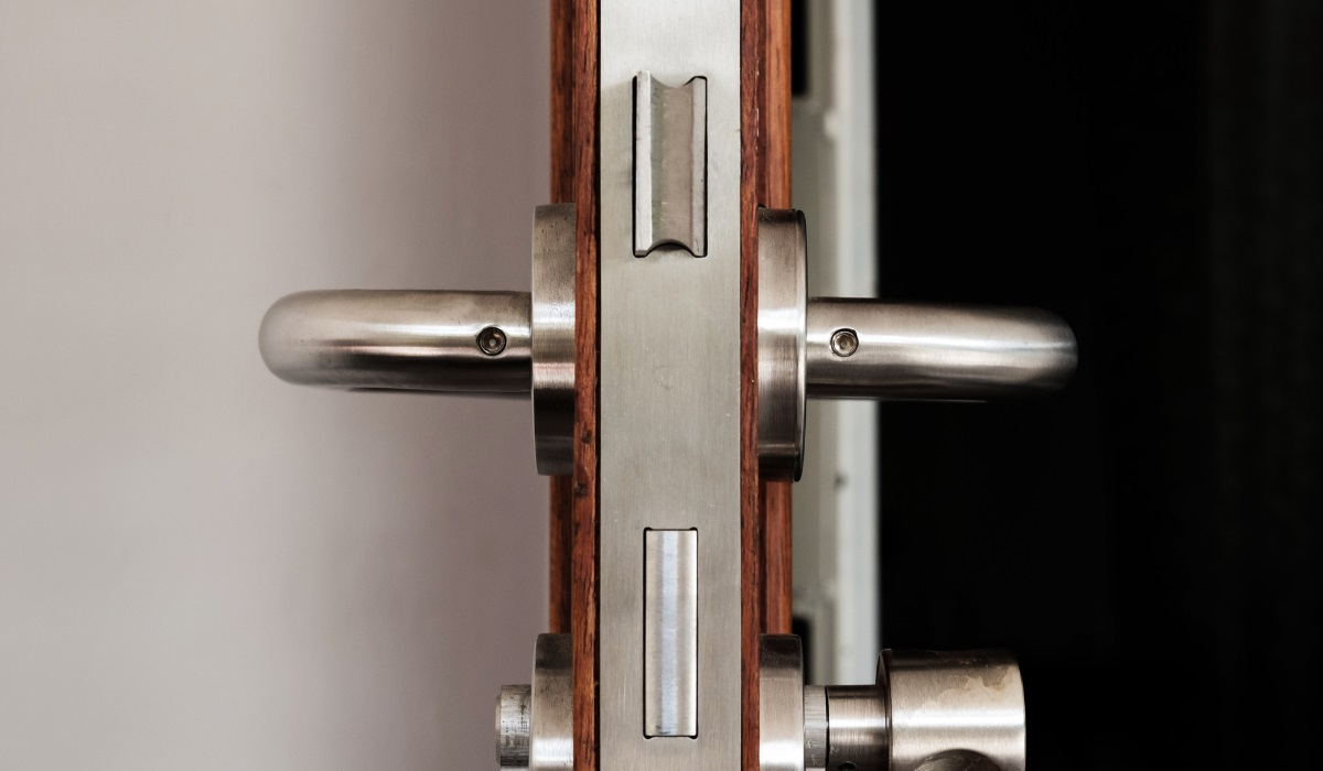 Wooden door with modern sash door lock - door frame close-up - with mortice lock 