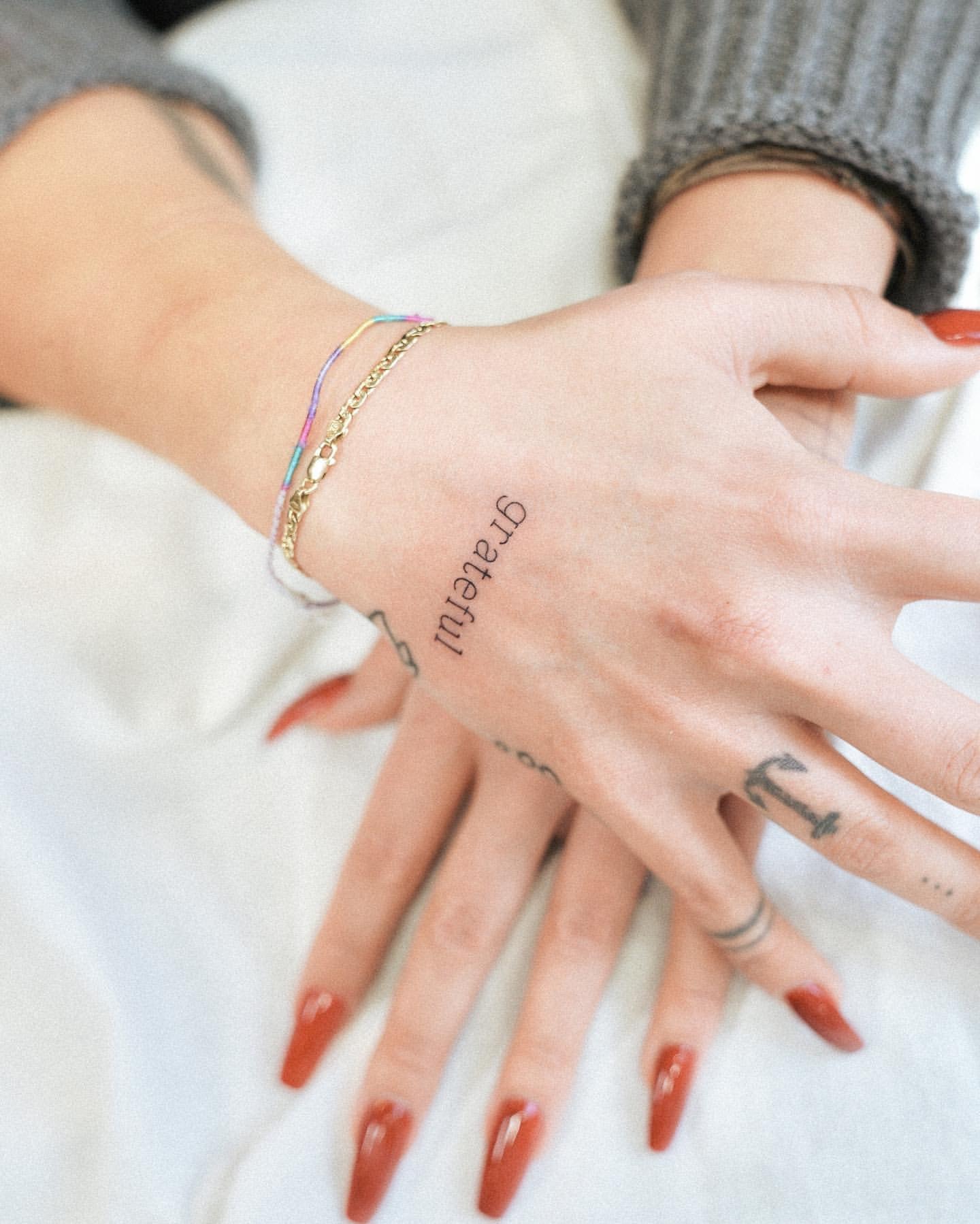 Wort tattoo hand