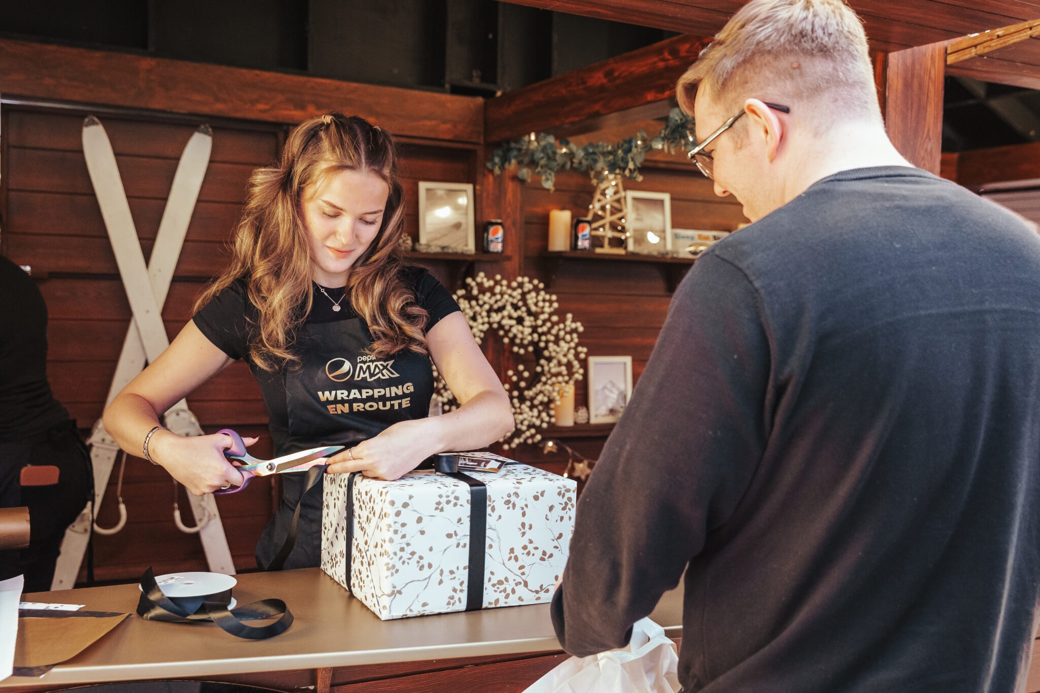OOH Advertising for Pepsi Max, offer a free present wrapping station at a major London Station