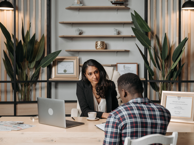 Image showing a personal injury lawyer speaking with a client.