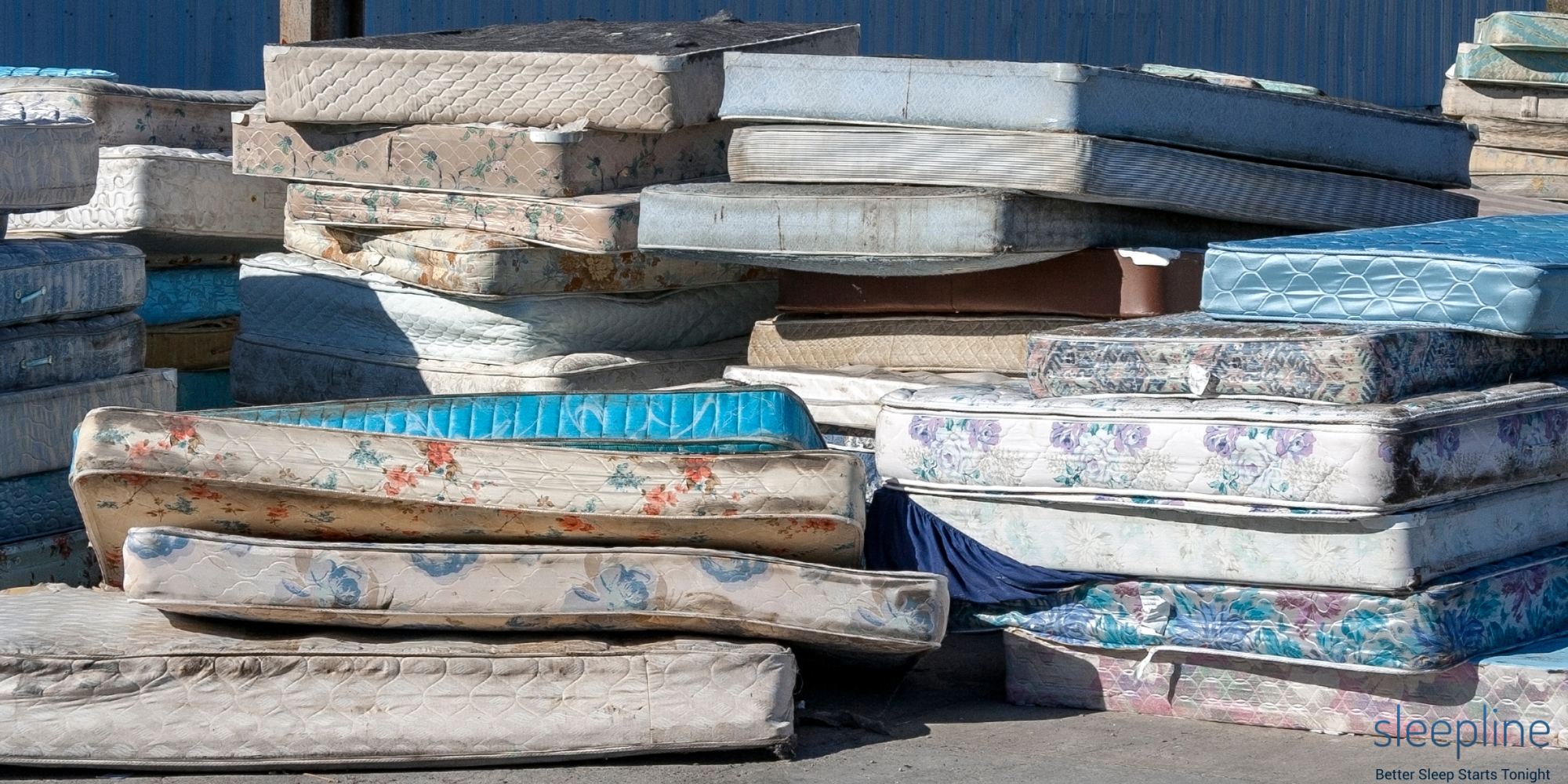 Used mattresses in a landfill