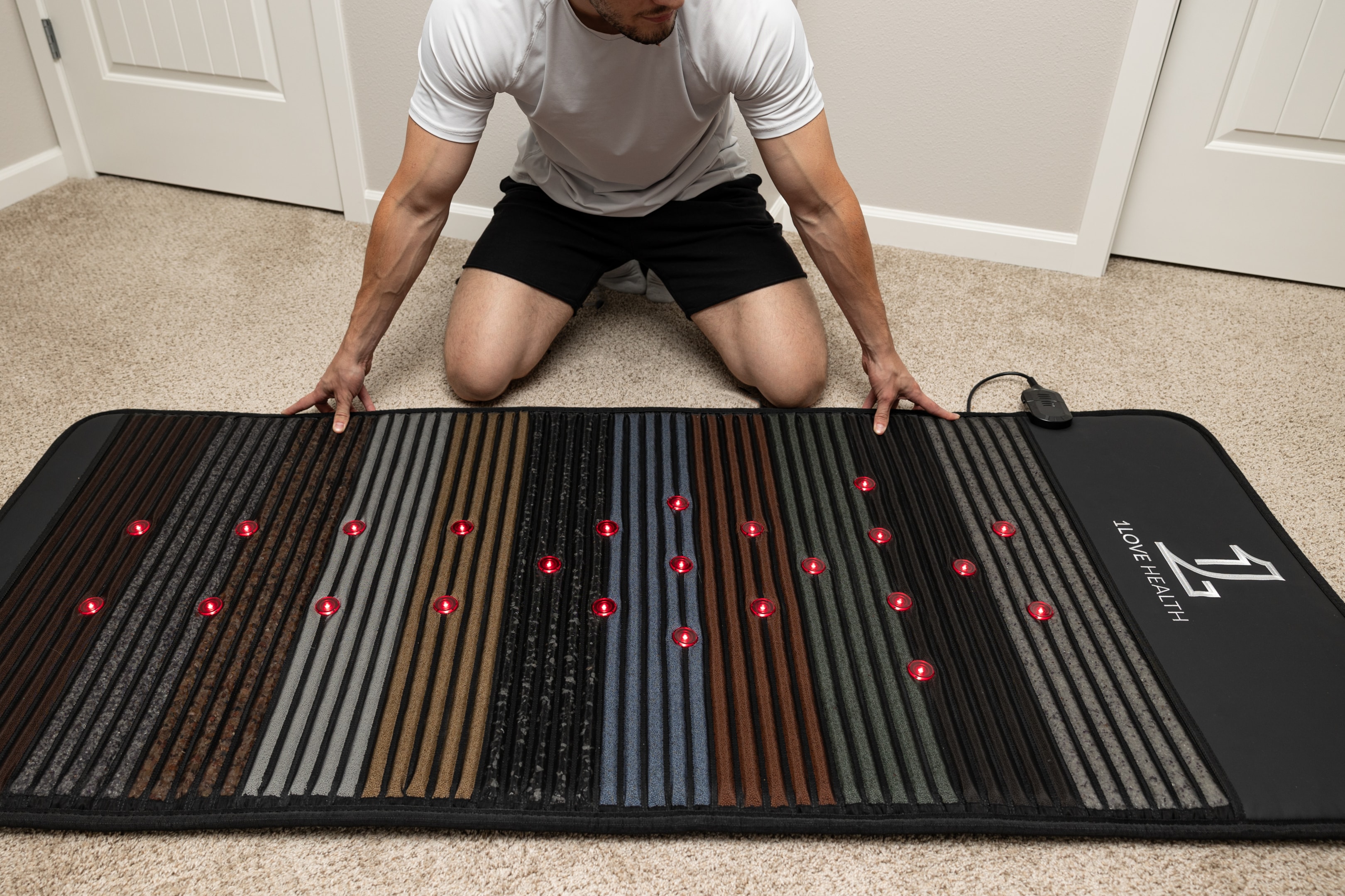 An illustration of a PEMF mat being used in a therapy session.