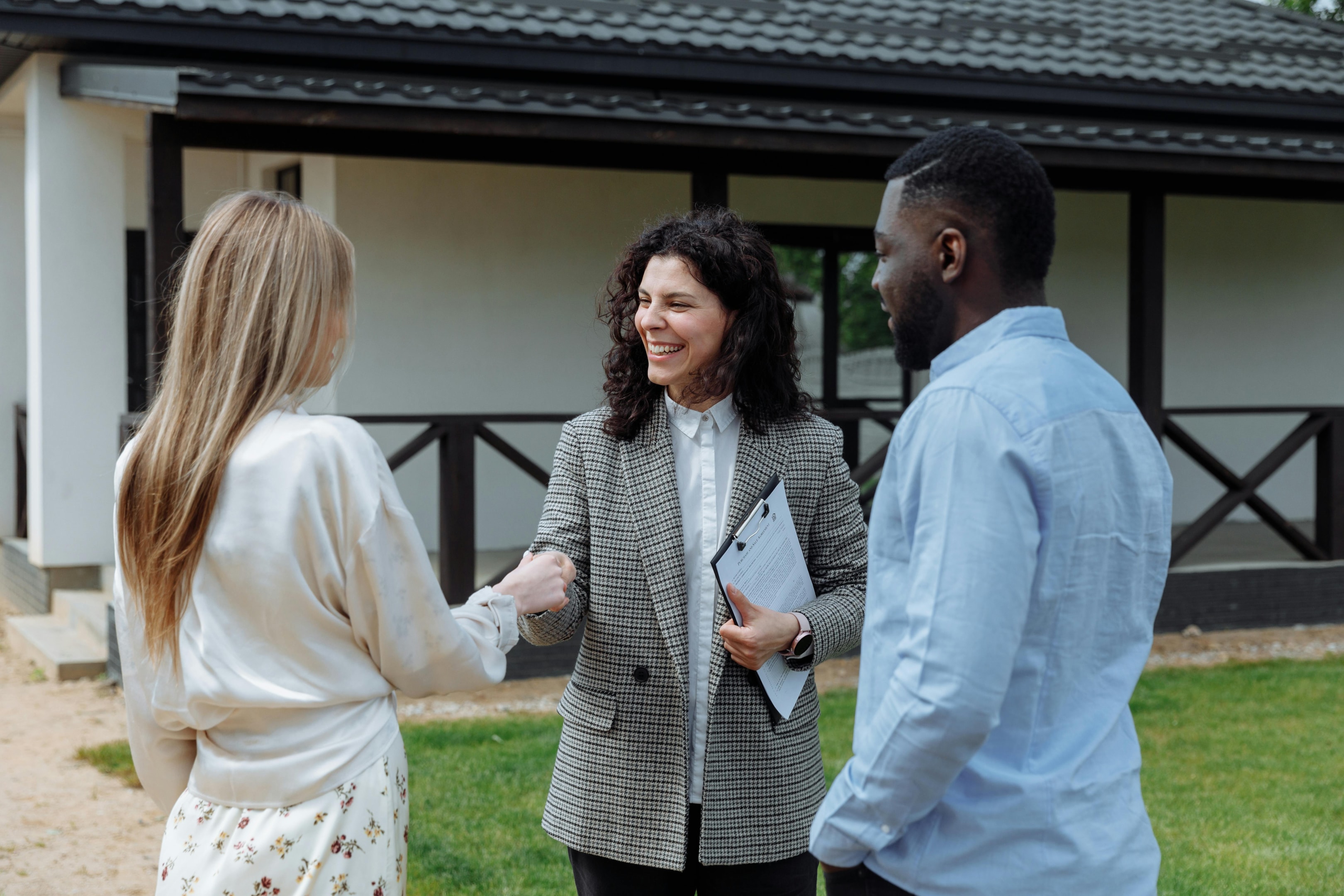 Investor meets with motivated sellers of inherited house to do a walk through and evaluate the property.