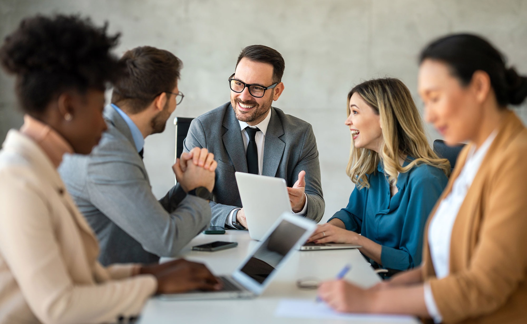 Smiling corporate meetings