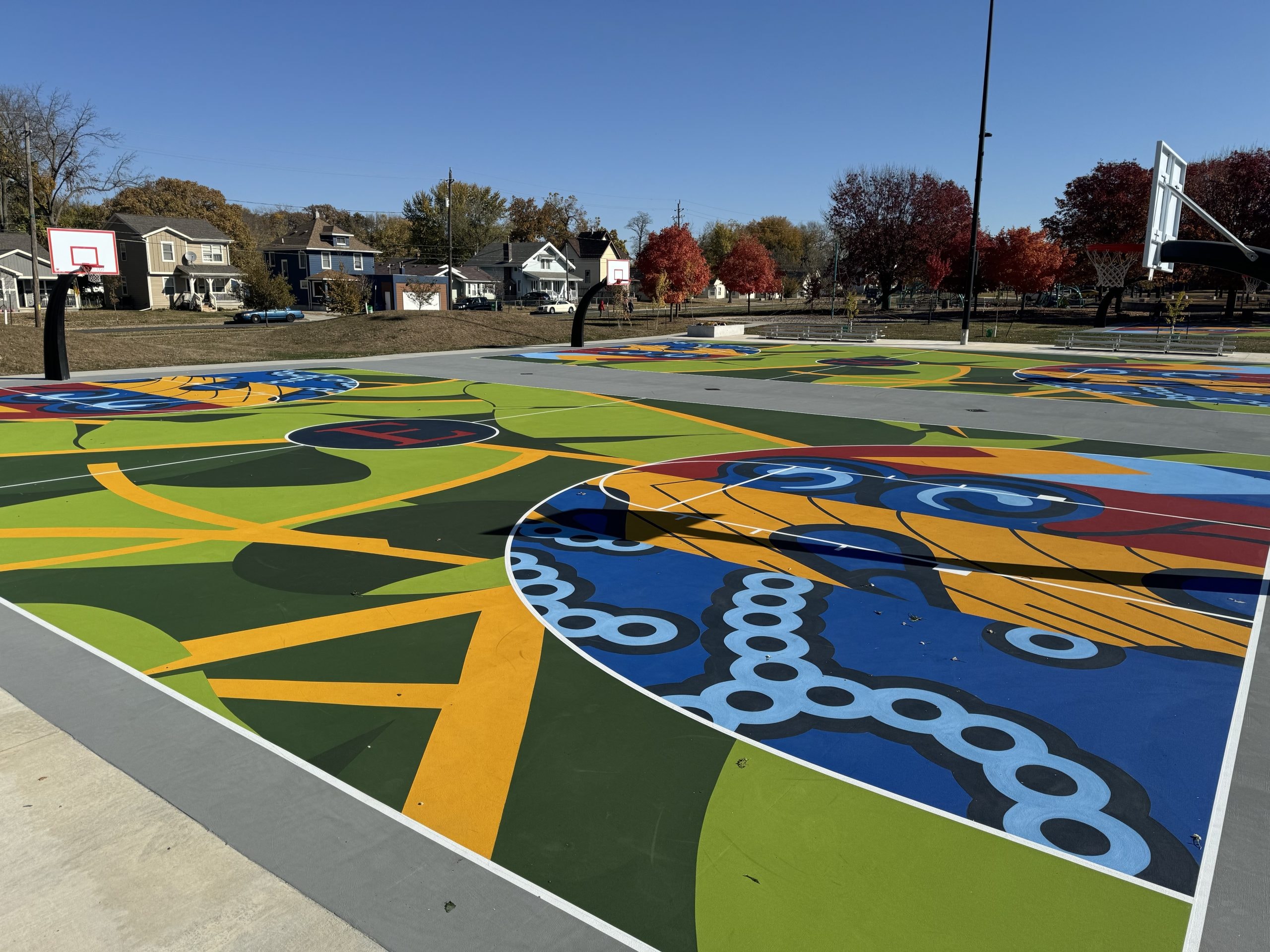 vibrant, artistic transformation for courts at Evelyn K. Davis Park