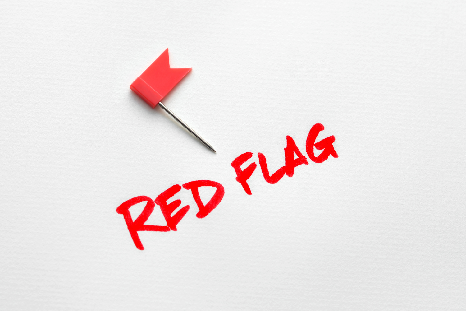 A red flag on white background.