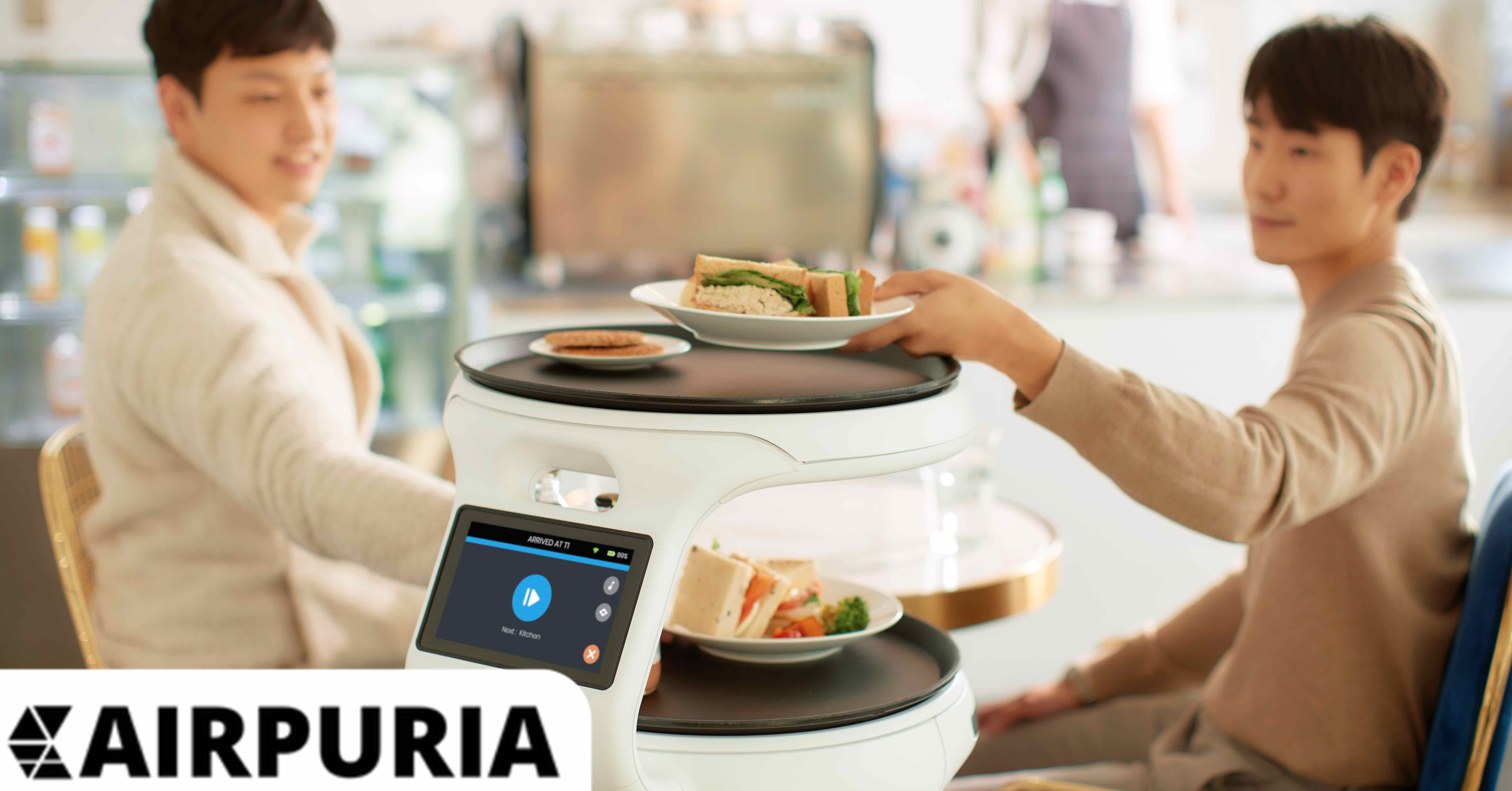 A Servi service robot delivering food to guests.