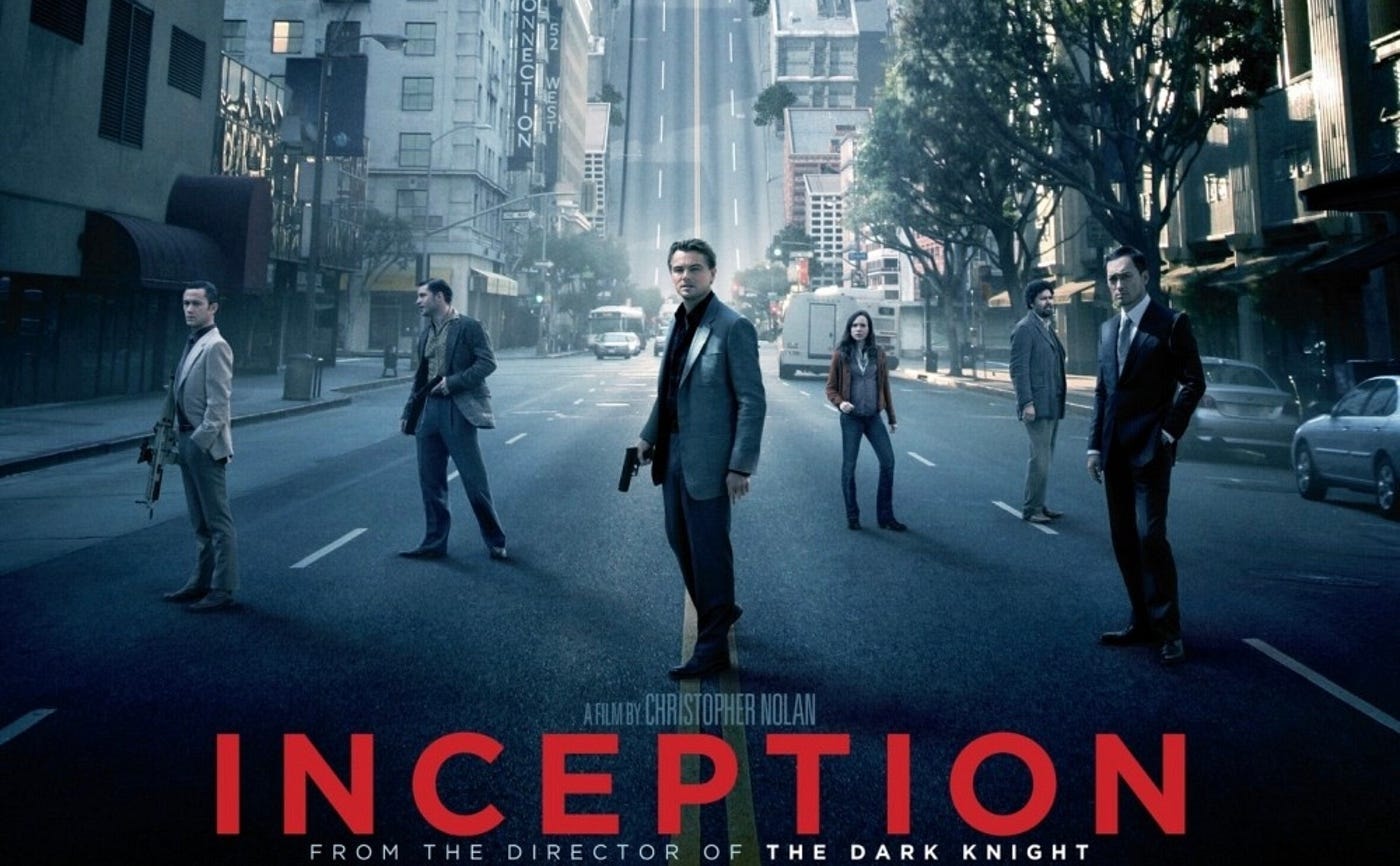  Alt: Inception movie poster featuring Leonardo DiCaprio and dream-like cityscapes.