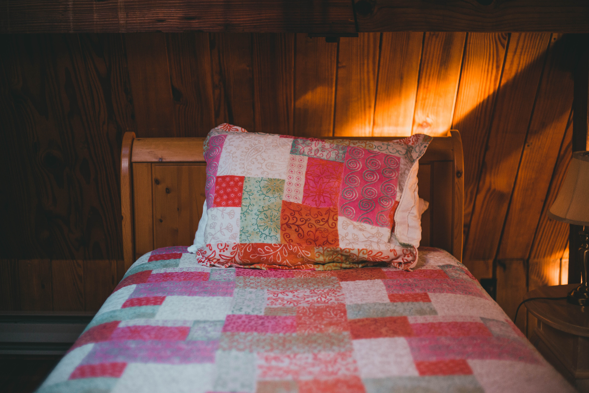 Colorful quilt with intricate stitching