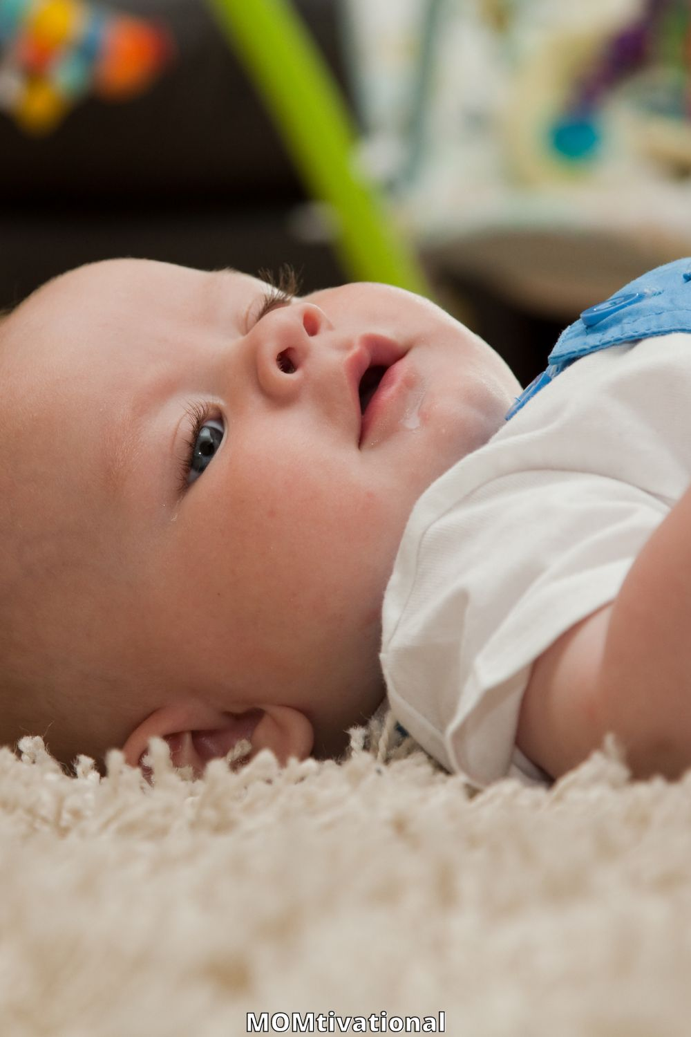 Handsome baby boy on the floor