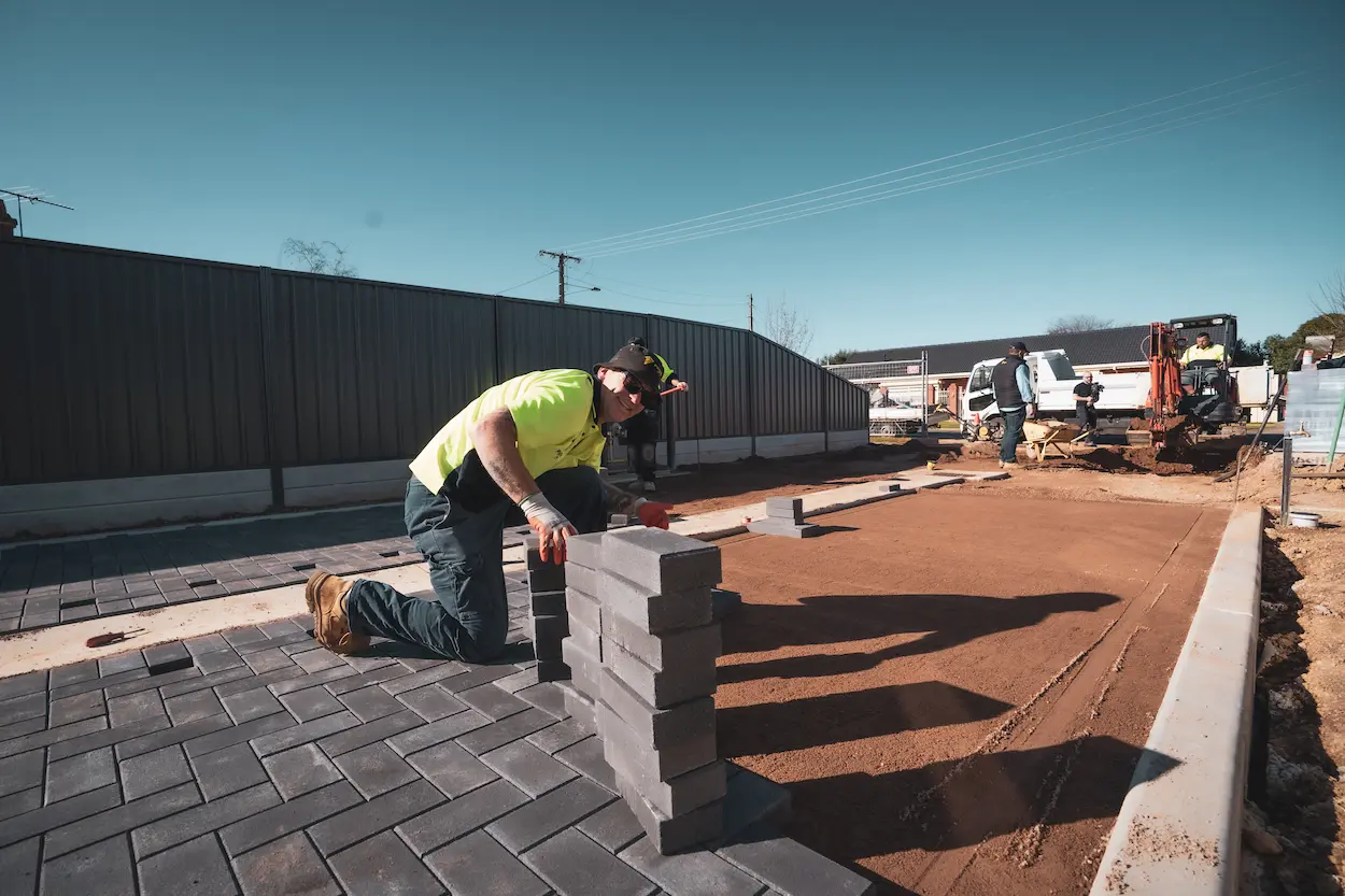 Pavers being laid in a pattern