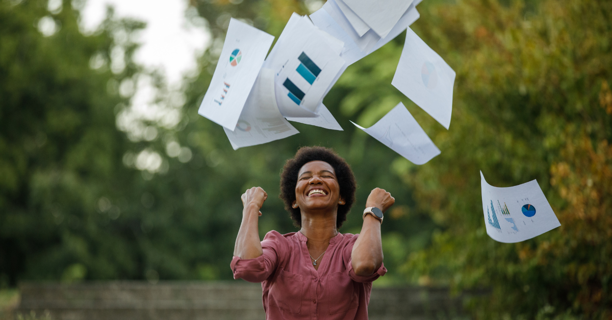 A creator celebrating success on doing creative ways to make money on OnlyFans while staying compliant with tax obligations.