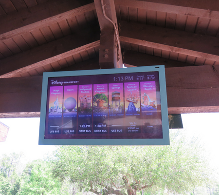 Disney Bus wait times are displayed on screens at each resort bus stop.