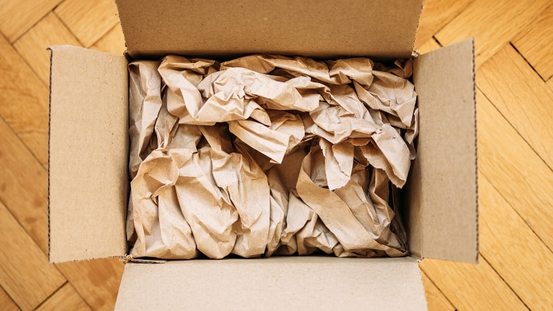 Crumpled paper in a box