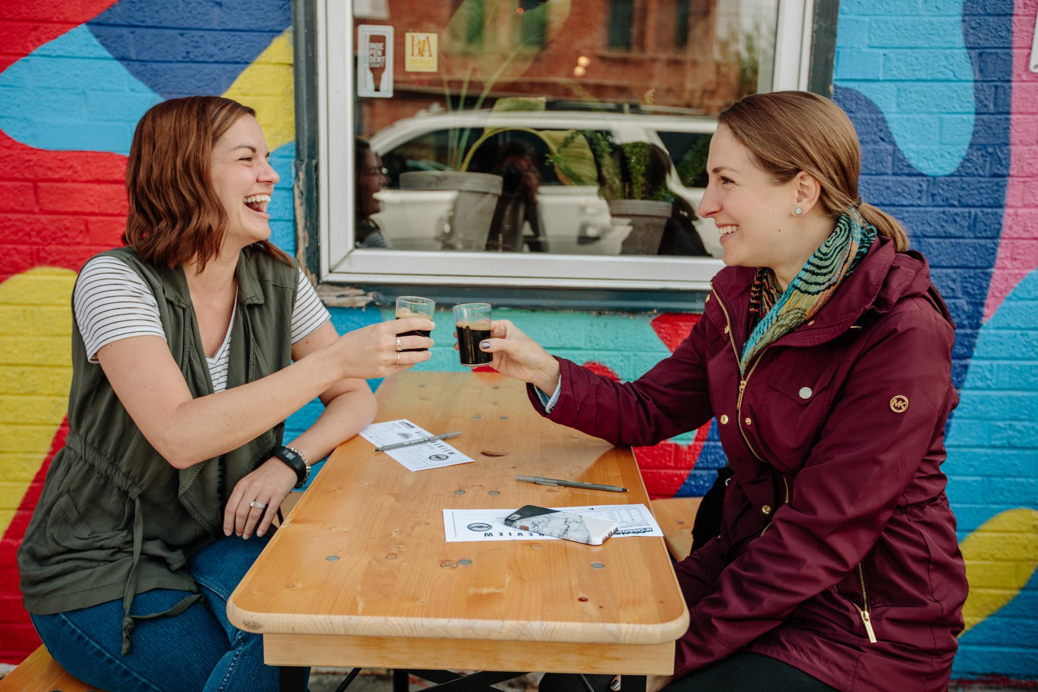 Two women sampling beer on a Denver Microbrew Tour
