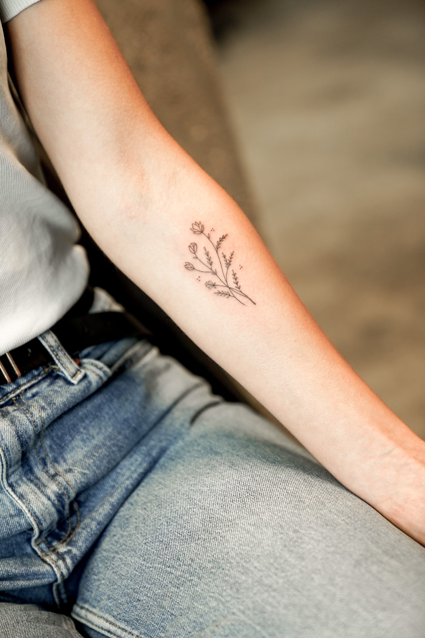 Blumenstrauss Tattoo auf Arm
