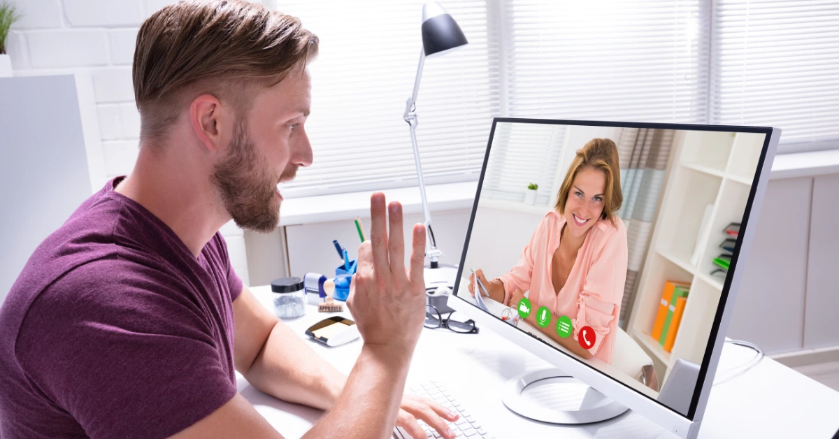 man with woman on virtual meeting